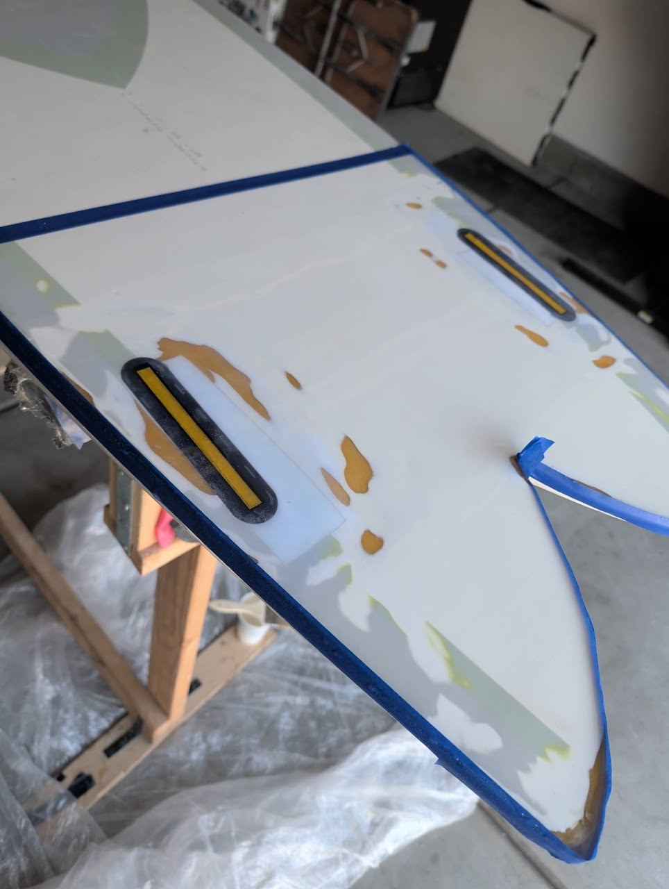 New Futures fin boxes set in the tail with the area masked off